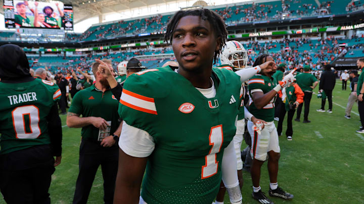 Nov 23, 2024; Miami Gardens, Florida, USA; Miami Hurricanes quarterback Cam Ward (1) looks on from the field after the game against the Wake Forest Demon Deacons at Hard Rock Stadium. Mandatory Credit: Sam Navarro-Imagn Images Nov 23, 2024; Miami Gardens, Florida, USA; Miami Hurricanes quarterback Cam Ward (1) looks on from the field after the game against the Wake Forest Demon Deacons at Hard Rock Stadium. Mandatory Credit: Sam Navarro-Imagn Images