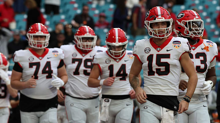 Dec 30, 2023; Miami Gardens, FL, USA; Georgia Bulldogs quarterback Carson Beck (15) takes the field before the 2023 Orange Bowl against the Florida State Seminoles at Hard Rock Stadium. Mandatory Credit: Nathan Ray Seebeck-USA TODAY Sports