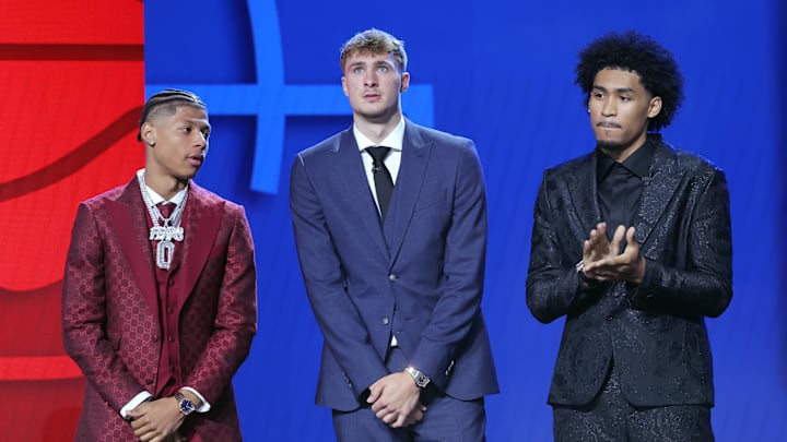 Jun 25, 2025; Brooklyn, NY, USA; Jeremiah Fears, Cooper Flagg, and Dylan Harper stand on stage before the 2025 NBA Draft at Barclays Center. Mandatory Credit: Brad Penner-Imagn Images Jun 25, 2025; Brooklyn, NY, USA; Jeremiah Fears, Cooper Flagg, and Dylan Harper stand on stage before the 2025 NBA Draft at Barclays Center. Mandatory Credit: Brad Penner-Imagn Images
