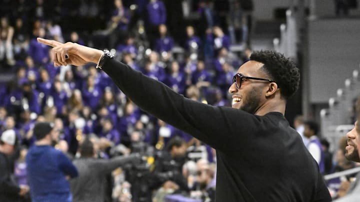 Jan 27, 2024; Evanston, Illinois, USA; Evan Turner, a former player for the Ohio State Buckeyes and former NBA player is seen pointing before the first half of the teams game against Northwestern Wildcats  at Welsh-Ryan Arena. Mandatory Credit: Matt Marton-Imagn Images