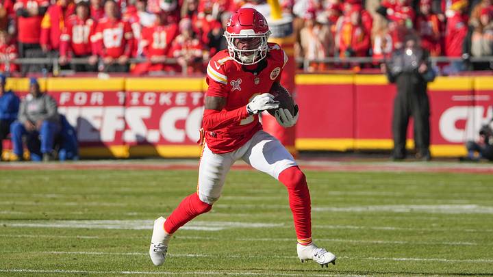 Dec 21, 2024; Kansas City, Missouri, USA; Kansas City Chiefs wide receiver Xavier Worthy (1) runs the ball against the Houston Texans during the first half at GEHA Field at Arrowhead Stadium. Mandatory Credit: Denny Medley-Imagn Images