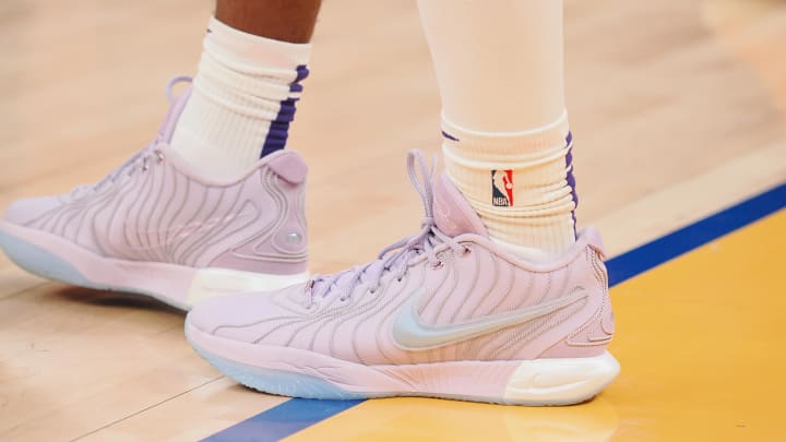 Bronny James wears the Nike LeBron 21.