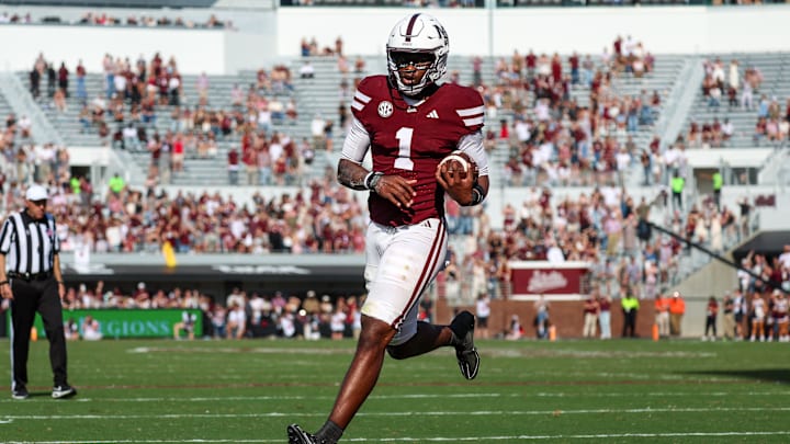 Nov 8, 2025; Starkville, Mississippi, USA; Mississippi State Bulldogs quarterback Kamario Taylor (1) runs for a touchdown against the Georgia Bulldogs during the second half at Davis Wade Stadium at Scott Field. Mandatory Credit: Wesley Hale-Imagn Images Nov 8, 2025; Starkville, Mississippi, USA; Mississippi State Bulldogs quarterback Kamario Taylor (1) runs for a touchdown against the Georgia Bulldogs during the second half at Davis Wade Stadium at Scott Field. Mandatory Credit: Wesley Hale-Imagn Images
