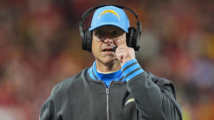 Dec 8, 2024; Kansas City, Missouri, USA; Los Angeles Chargers head coach Jim Harbaugh looks on during the first half against the Kansas City Chiefs at GEHA Field at Arrowhead Stadium. Mandatory Credit: Jay Biggerstaff-Imagn Images