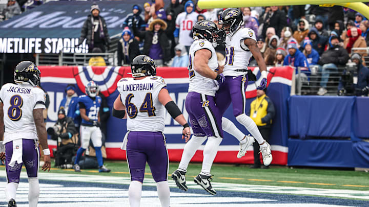 Baltimore Ravens wide receiver Devontez Walker celebrates his touchdown with teammates against the New York Giants.