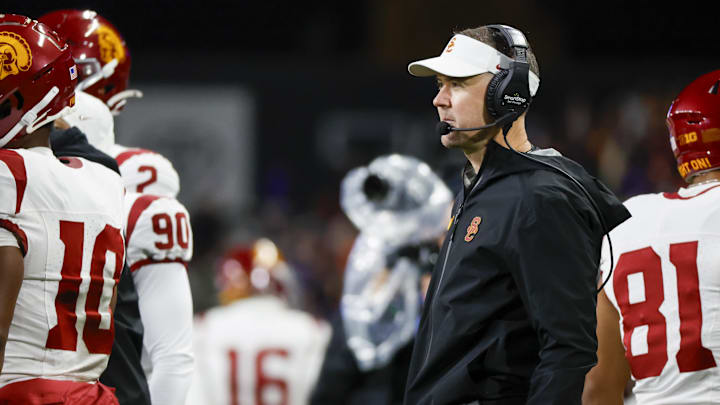 Nov 2, 2024; Seattle, Washington, USA; USC Trojans head coach Lincoln Riley stands on the sideline during the fourth quarter against the Washington Huskies at Alaska Airlines Field at Husky Stadium. Mandatory Credit: Joe Nicholson-Imagn Images