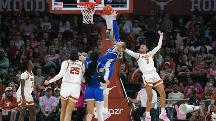 Feb 9, 2026; Austin, Texas, USA; Texas Longhorns guard Jordan Lee (7) blocks Kentucky Wildcats center Clara Strack (13) during the second half at Moody Center. Mandatory Credit: Dustin Safranek-Imagn Images
