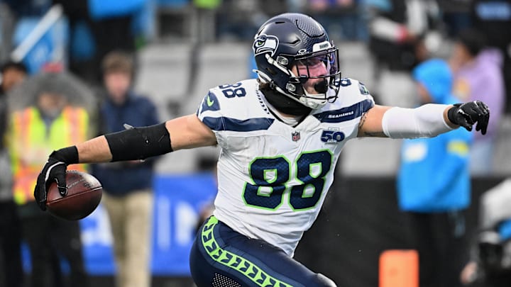 Seattle Seahawks tight end AJ Barner (88) reacts after catching a seventeen-yard touchdown pass thrown by quarterback Sam Darnold (not pictured) against the Carolina Panthers during the third quarter at Bank of America Stadium. 