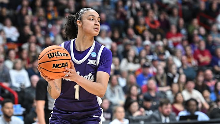 Mar 29, 2025; Spokane, WA, USA; Kansas State Wildcats guard Zyanna Walker (1) rebounds against the USC Trojans during the second half of a Sweet 16 NCAA Tournament basketball game against the Kansas State Wildcats at Spokane Arena.