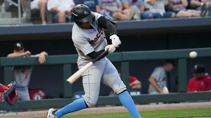 Rocket City infielder Christian Moore (7) hits a home run during a minor league baseball game between the Knoxville Smokies and Rocket City Trash Pandas at Covenant Health Park on April 29, 2025. The Knoxville Smokies won 9-6 against the Rocket City Trash Pandas.