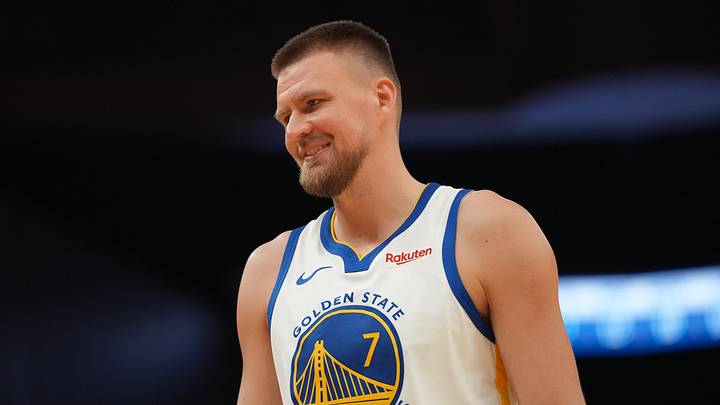 Apr 5, 2026; San Francisco, California, USA; Golden State Warriors forward Kristaps Porzingis (7) smiles during a break in the action against the Houston Rockets in the second quarter at the Chase Center. Mandatory Credit: Cary Edmondson-Imagn Images