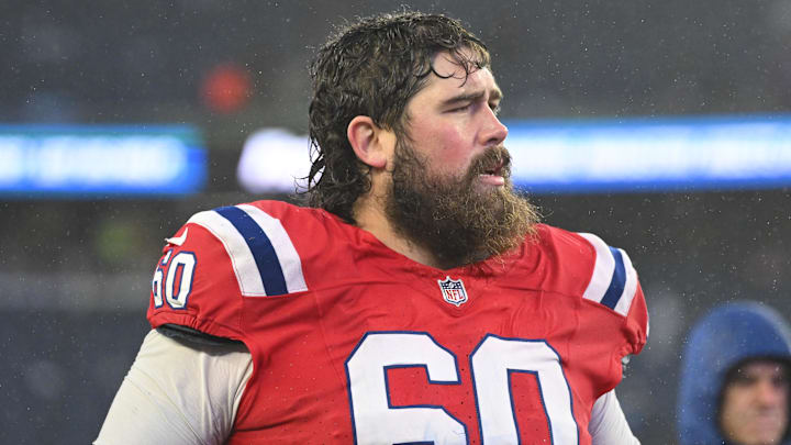 Dec 3, 2023; Foxborough, Massachusetts, USA; New England Patriots center David Andrews (60) walks off of the field after a game against the Los Angeles Chargers at Gillette Stadium. Mandatory Credit: Brian Fluharty-Imagn Images