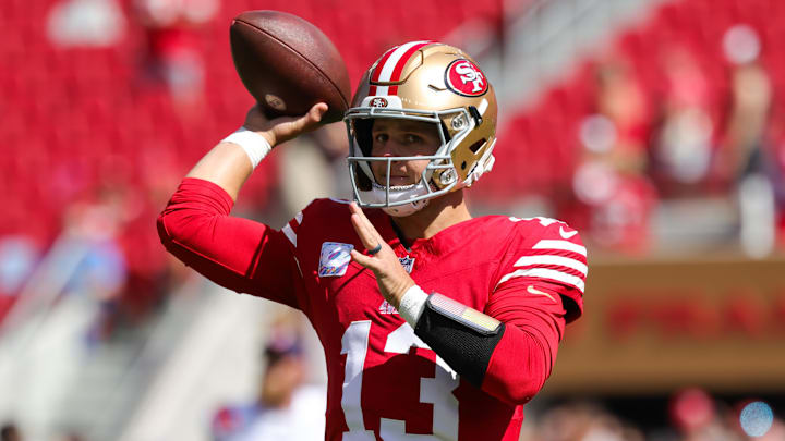 Sep 29, 2024; Santa Clara, California, USA; San Francisco 49ers quarterback Brock Purdy (13) warms up before the game against the New England Patriots at Levi's Stadium. Mandatory Credit: Sergio Estrada-Imagn Images