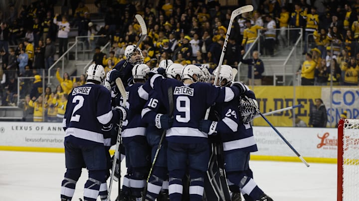 The Penn State Nittany Lions celebrate their win over the Michigan Wolverines in the Big Ten Men's Hockey Tournament.