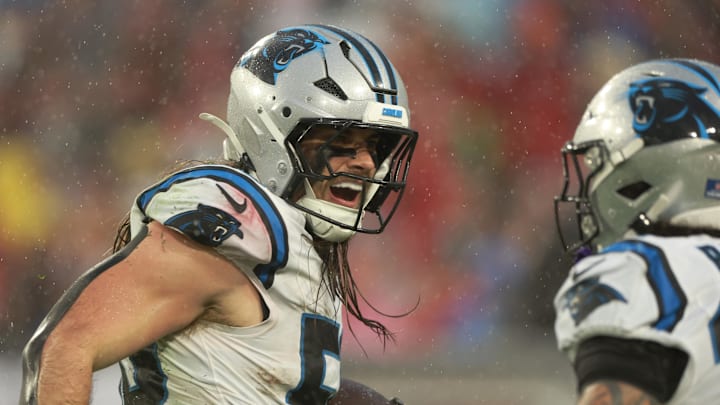 Carolina Panthers linebacker Christian Rozeboom (56) celebrates intercepting the ball against the Tampa Bay Buccaneers