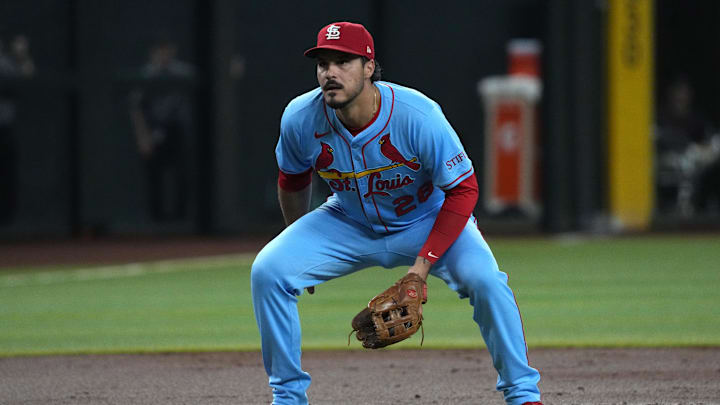 Jul 19, 2025; Phoenix, Arizona, USA; St. Louis Cardinals third base Nolan Arenado (28) gets ready to field the ball against the Arizona Diamondbacks in the first inning at Chase Field. Mandatory Credit: Rick Scuteri-Imagn Images