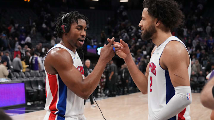 Dec 26, 2024; Sacramento, California, USA; Detroit Pistons guard Jaden Ivey (23) and guard Cade Cunningham (2) celebrate after the win against the Sacramento Kings at Golden 1 Center. Mandatory Credit: Kelley L Cox-Imagn Images