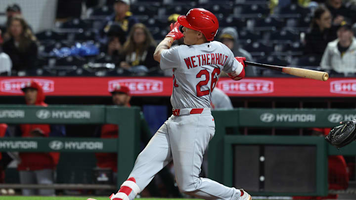 Apr 29, 2026; Pittsburgh, Pennsylvania, USA;  St. Louis Cardinals second baseman JJ Wetherholt (26) hits a double against  the Pittsburgh Pirates during the ninth inning at PNC Park. Mandatory Credit: Charles LeClaire-Imagn Images