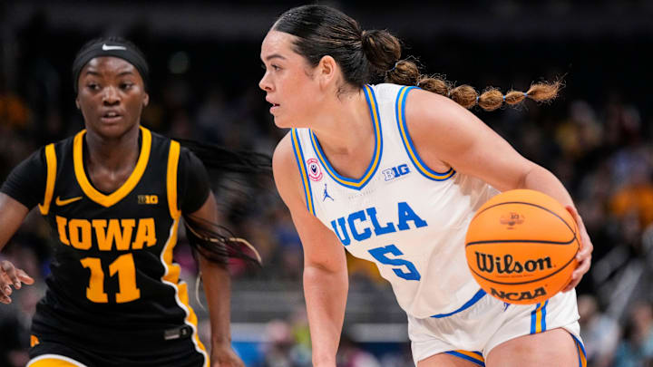 UCLA Bruins guard Charlisse Leger-Walker (5) rushes up the court Sunday, March 8, 2026, during the Big Ten Tournament Championship game at Gainbridge Fieldhouse in Indianapolis. UCLA Bruins guard Charlisse Leger-Walker (5) rushes up the court Sunday, March 8, 2026, during the Big Ten Tournament Championship game at Gainbridge Fieldhouse in Indianapolis.