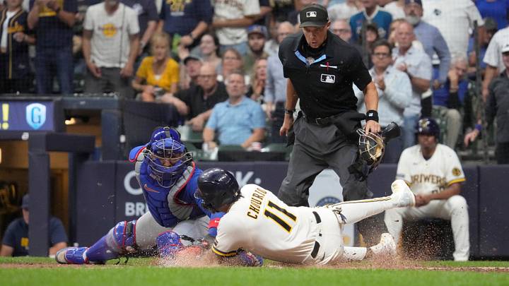 Sep 8, 2026; Milwaukee, Wisconsin, USA;  Chicago Cubs catcher Miguel Amaya (9) tags out Milwaukee Brewers left fielder Jackson Chourio (11) in the sixth inning at American Family Field.  Mandatory Credit: Michael McLoone-Imagn Images