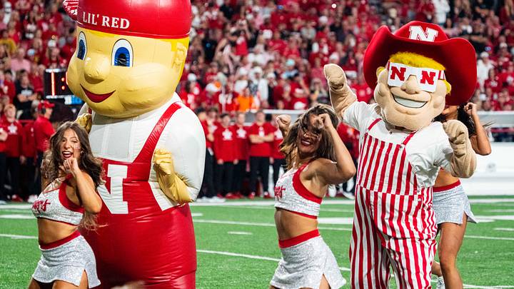 Sep 7, 2024; Lincoln, Nebraska, USA; Lil’ Red and Herbie Husker perform with the Scarletts during the third quarter between the Nebraska Cornhuskers and the Colorado Buffaloes at Memorial Stadium. Sep 7, 2024; Lincoln, Nebraska, USA; Lil’ Red and Herbie Husker perform with the Scarletts during the third quarter between the Nebraska Cornhuskers and the Colorado Buffaloes at Memorial Stadium.