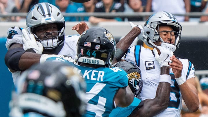 Jacksonville Jaguars cornerback Jourdan Lewis (2) breaks up a pass by Carolina Panthers quarterback Bryce Young (9) during the second quarter of an NFL football game between the Carolina Panthers at Jacksonville Jaguars at EverBank Stadium Sunday September 7, 2025. Jacksonville Jaguars cornerback Jourdan Lewis (2) breaks up a pass by Carolina Panthers quarterback Bryce Young (9) during the second quarter of an NFL football game between the Carolina Panthers at Jacksonville Jaguars at EverBank Stadium Sunday September 7, 2025.