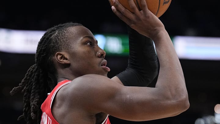 Feb 3, 2026; Milwaukee, Wisconsin, USA; Chicago Bulls guard Ayo Dosunmu (11) puts up a shot against the Milwaukee Bucks in the first half at Fiserv Forum. 