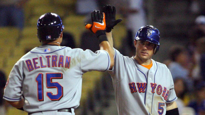 Jul 19, 2007; Los Angeles, CA, USA; New York Mets center fielder Carlos Beltran (15) is congratulated by third baseman David Wright (5) after he hits a solo home run in the eighth inning against the Los Angeles Dodgers at Dodger Stadium. The Mets defeated the Dodgers 13-9. Mandatory Credit: Gary A. Vasquez-Imagn Images Copyright © 2007 Gary A. Vasquez Jul 19, 2007; Los Angeles, CA, USA; New York Mets center fielder Carlos Beltran (15) is congratulated by third baseman David Wright (5) after he hits a solo home run in the eighth inning against the Los Angeles Dodgers at Dodger Stadium. The Mets defeated the Dodgers 13-9. Mandatory Credit: Gary A. Vasquez-Imagn Images Copyright © 2007 Gary A. Vasquez
