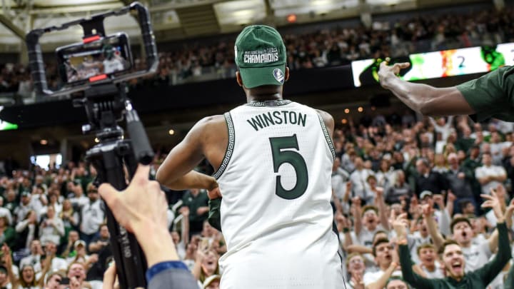 Michigan State's Cassius Winston celebrates after beating Ohio State on Sunday, March 8, 2020, at the Breslin Center in East Lansing. The Spartans won a share of the Big Ten Championship.

200308 Msu Osu 252a