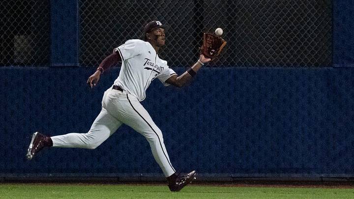 Texas A&M Aggies' Jorian Wilson (23) catches a fly ball as Auburn Tigers take on Texas A&M Aggies during the SEC baseball tournament at Hoover Metropolitan Stadium in Hoover, Ala. on Friday, May 22, 2026. Auburn Tigers defeated Texas A&M Aggies 7-0. Texas A&M Aggies' Jorian Wilson (23) catches a fly ball as Auburn Tigers take on Texas A&M Aggies during the SEC baseball tournament at Hoover Metropolitan Stadium in Hoover, Ala. on Friday, May 22, 2026. Auburn Tigers defeated Texas A&M Aggies 7-0.