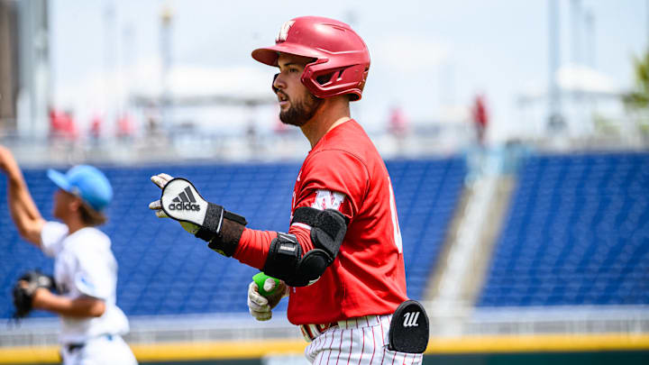 Cayden Brumbaugh points to the dugout after his first inning single. Cayden Brumbaugh points to the dugout after his first inning single.
