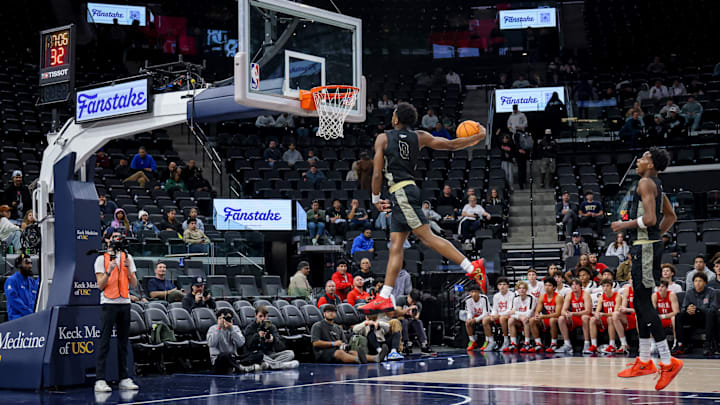 St. John Bosco’s Brandon McCoy throws down a windmill dunk against Mater Dei at the Intuit Dome on Saturday, Feb. 1, 2025.