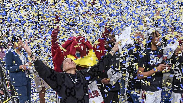 South Carolina Coach Dawn Staley celebrates with the team after the SEC Women's Basketball Tournament Championship at the Bon Secours Wellness Arena in Greenville, SC on Sunday, March 10, 2024. South Carolina Coach Dawn Staley celebrates with the team after the SEC Women's Basketball Tournament Championship at the Bon Secours Wellness Arena in Greenville, SC on Sunday, March 10, 2024.