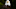 Bald eagle with blurred green background