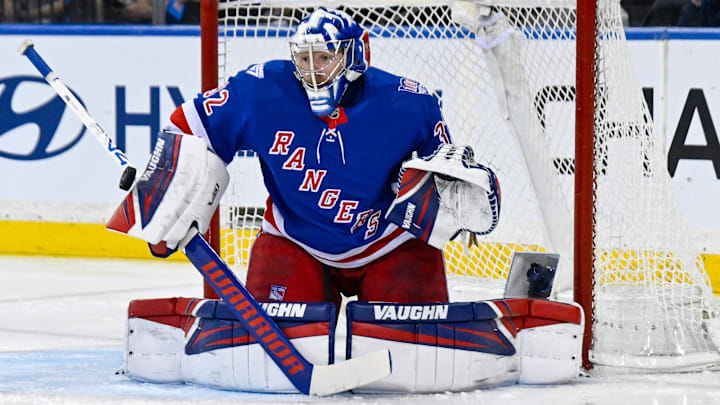 Mar 10, 2026; New York, New York, USA;  New York Rangers goaltender Jonathan Quick (32) makes a save against the Calgary Flames during the second period at Madison Square Garden. Mandatory Credit: Dennis Schneidler-Imagn Images