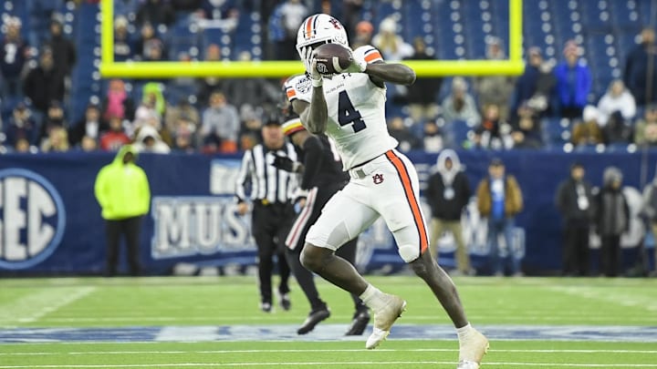Dec 30, 2023; Nashville, TN, USA; Auburn Tigers wide receiver Camden Brown (4) makes a catch against