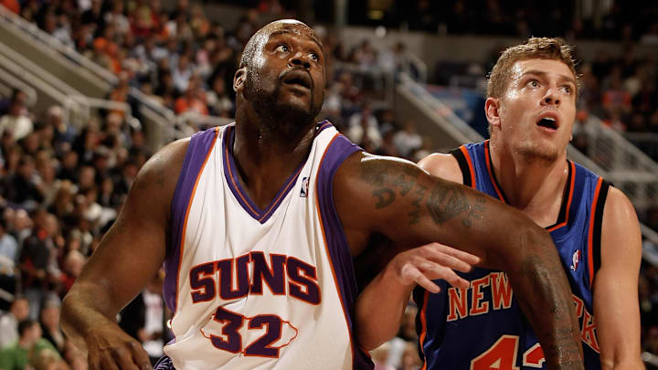 Dec 15, 2008; Phoenix, AZ, USA; Phoenix Suns center Shaquille O'Neal (32) against New York Knicks player David Lee (42) in the first quarter at US Airways Center. Mandatory Credit: Rick Scuteri-US Presswire