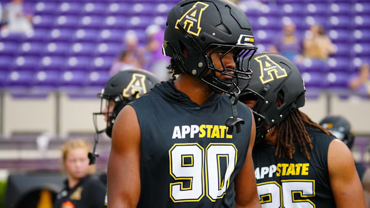 Sep 14, 2024; Greenville, North Carolina, USA; Appalachian State Mountaineers linebacker Nate Johnson (90) looks on before the game during the warmups against the East Carolina Pirates at Dowdy-Ficklen Stadium. Sep 14, 2024; Greenville, North Carolina, USA; Appalachian State Mountaineers linebacker Nate Johnson (90) looks on before the game during the warmups against the East Carolina Pirates at Dowdy-Ficklen Stadium.