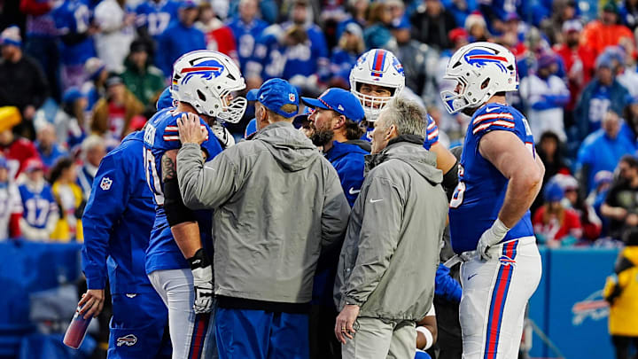 Buffalo Bills offensive tackle Alec Anderson (70) who was down on the field after the play gets checked out by Bills trainers during second half action at the Bills home game against the New York Jets at Highmark Stadium in Orchard Park on Dec. 29, 2024. Buffalo Bills offensive tackle Alec Anderson (70) who was down on the field after the play gets checked out by Bills trainers during second half action at the Bills home game against the New York Jets at Highmark Stadium in Orchard Park on Dec. 29, 2024.