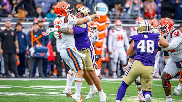 Ta'ita'i Uiagalelei got to the quarterback a tad late for a sack and to prevent the pass, and then drew a UW roughing call. 