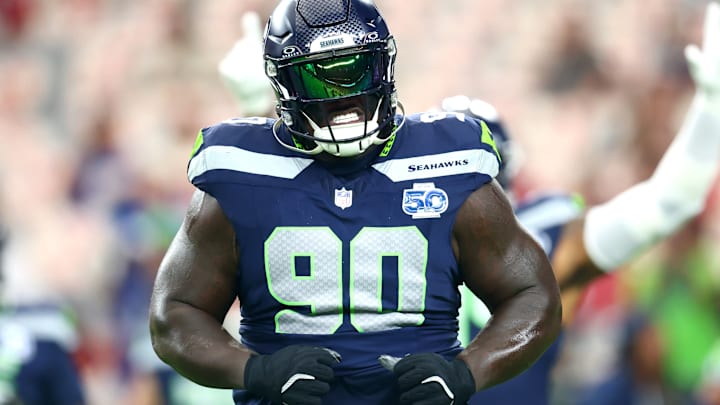 Sep 25, 2025; Glendale, Arizona, USA; Seattle Seahawks defensive tackle Jarran Reed (90) reacts before the game against the Arizona Cardinals at State Farm Stadium. 