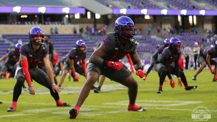 The Frogs get ready to go with a pregame stretch before a Big 12 matchup against Oklahoma State. 