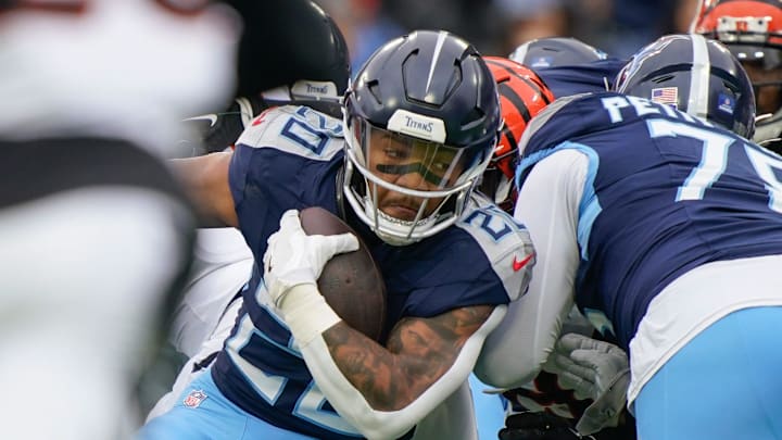 Tennessee Titans running back Tony Pollard (20) runs for a first down during the first quarter at Nissan Stadium in Nashville, Tenn., Sunday, Dec. 15, 2024. Tennessee Titans running back Tony Pollard (20) runs for a first down during the first quarter at Nissan Stadium in Nashville, Tenn., Sunday, Dec. 15, 2024.