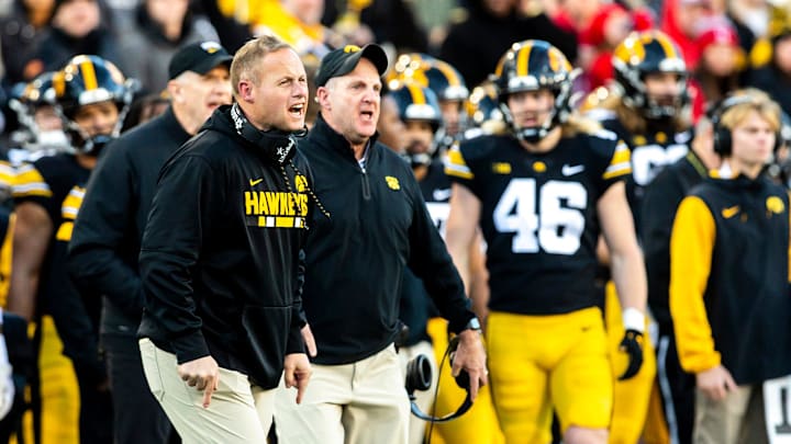 Iowa assistant defensive coordinator and linebackers coach Seth Wallace, left, and defensive coordinator Phil Parker react during a NCAA Big Ten Conference football game against Nebraska, Friday, Nov. 25, 2022, at Kinnick Stadium in Iowa City, Iowa.

221121 Nebraska Iowa Fb 027 Jpg