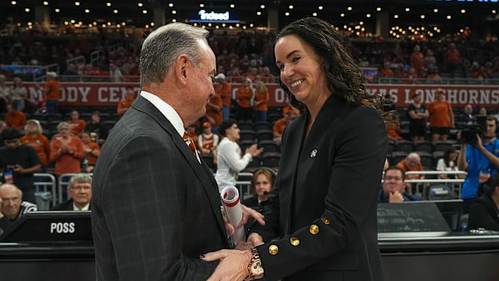Texas Longhorns head coach Vic Schaefer meets Illinois head coach Shauna Green ahead of the second round NCAA playoff game against Illinois at the Moody Center on Monday, March 24, 2025.