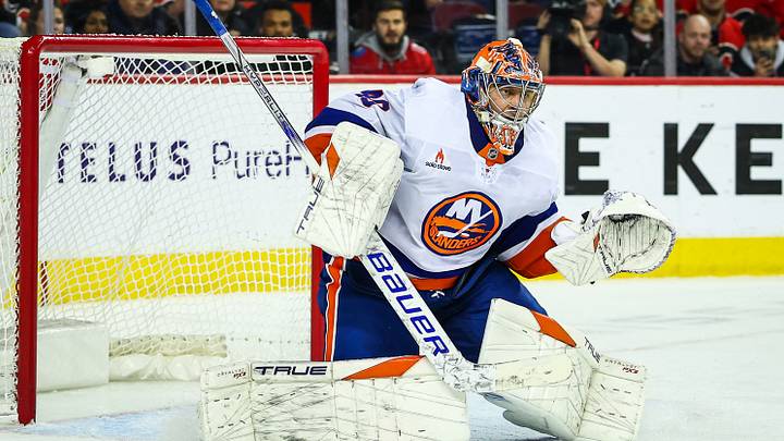 Nov 19, 2024; Calgary, Alberta, CAN; New York Islanders goaltender Semyon Varlamov (40) guards his net against the Calgary Flames during the overtime period at Scotiabank Saddledome. Mandatory Credit: Sergei Belski-Imagn Images