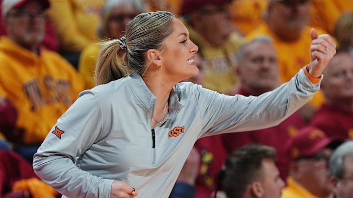 Oklahoma State Cowgirls head coach Jacie Hoyt reacts after a score against Iowa State during the second quarter in the senior day women basketball at Hilton Coliseum on February. 25, 2026, in Ames, Iowa.