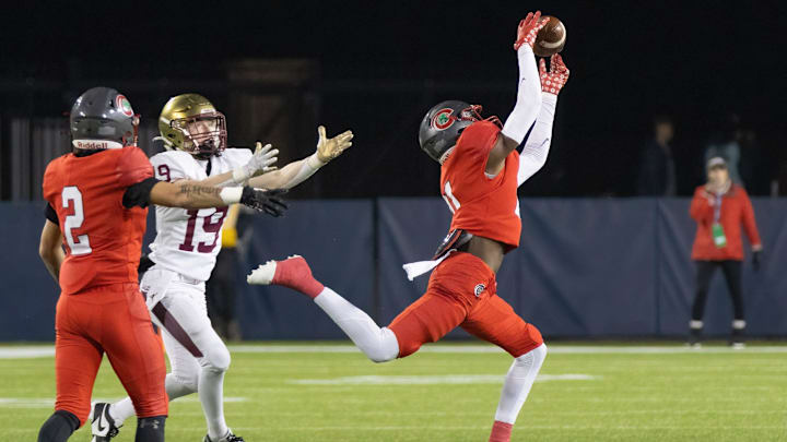 Toledo Central Catholic   s Victor Singleton Jr. intercepts a pass intended Bishop Watterson   s Cal Mangini ending the Eagles' final drive during the Division III state final Friday, Dec. 1, 2023, in Canton.