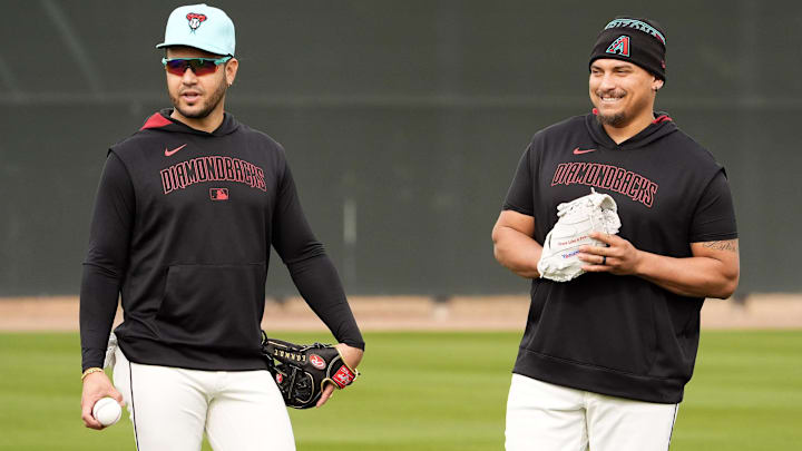 Arizona Diamondbacks infielders Eugenio Su‡rez and Josh Naylor (right) during spring training workouts at Salt River Fields at Talking Stick on Feb. 17, 2025, in Scottsdale.