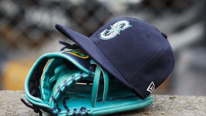 May 12, 2018; Detroit, MI, USA; Hat and glove of Seattle Mariners center fielder Dee Gordon (9) sits in dugout during the third inning against the Detroit Tigers at Comerica Park. Mandatory Credit: Rick Osentoski-Imagn Images
